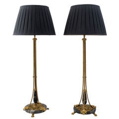 Pair of Large Bronze, Steel and Portor Marble Lamps