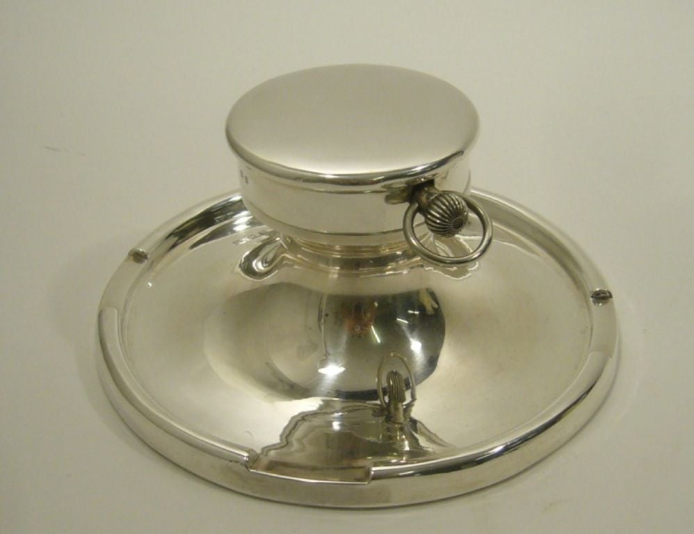 A striking Captain's Silver Clock Inkwell, with silver marks of Birmingham 1912, rubbed makers mark