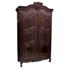 Elaborately Carved French Walnut and Fruitwood Armoire