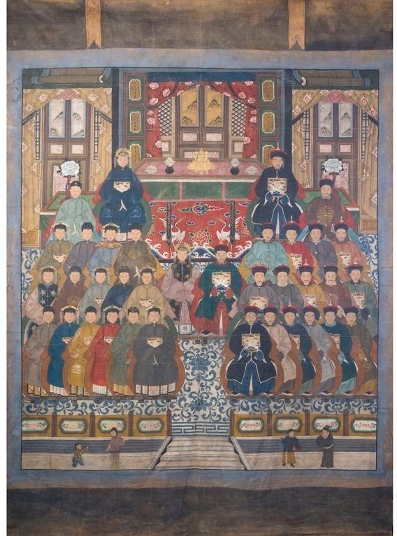 Chinese Ancestor Painting with figures bearing Imperial Insignia, Shanxi Province, China.<br />
<br />
With numerous male and female sitters set out in four rows wearing brightly coloured robes, hats and headdresses. All seated in front of a table