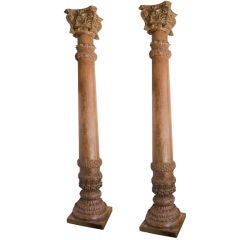 An Impressive Pair of Indian Carved Acacia Wood Columns