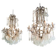 A Pair of French Wrought Iron and Glass 8-light Chandeliers