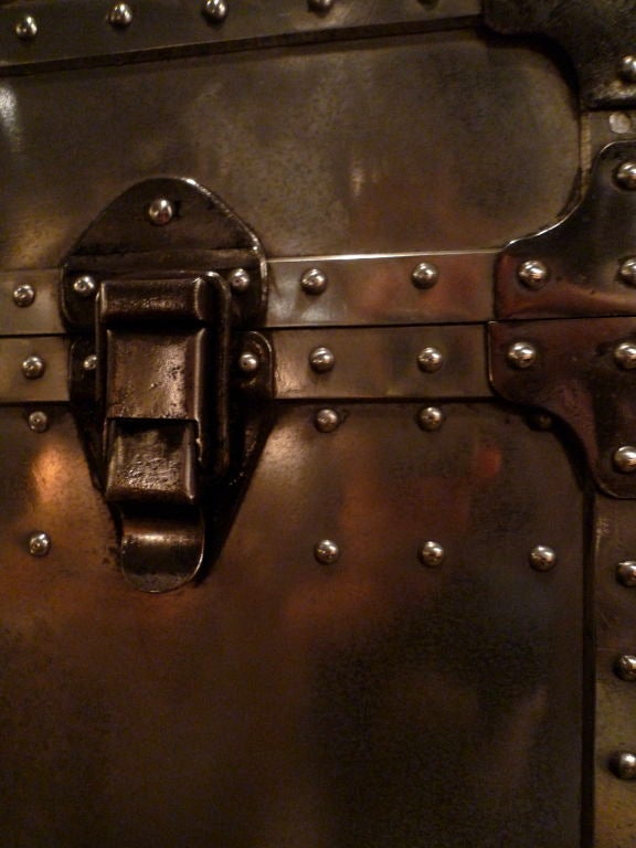 A Pair of Aluminium studded trunks with locks