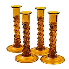 Antique Set of Four Amber Glass Twisted Candlesticks
