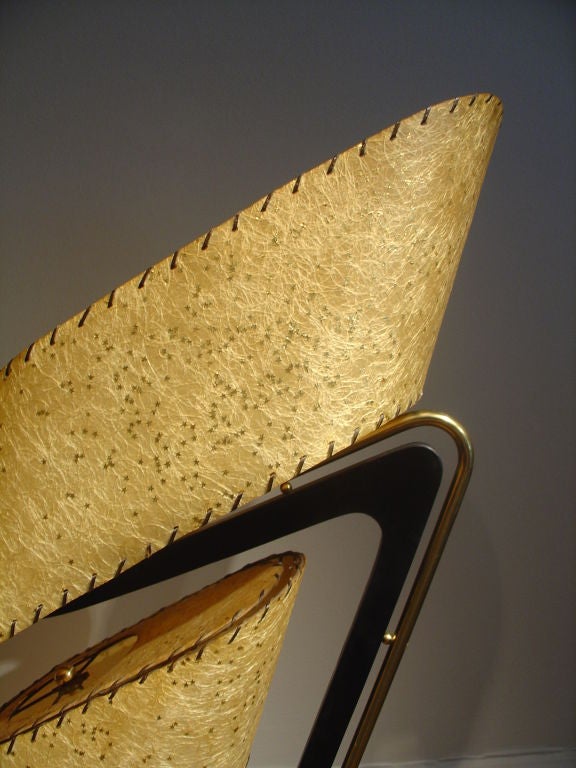 A Two Tier Lamp Base with Original Shades in Black Metal and Brass.
