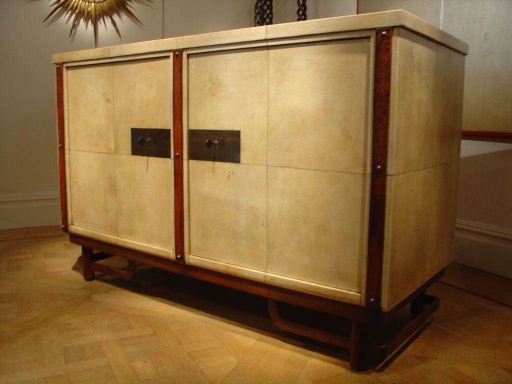 Pair of Leather and Vellum Commodes