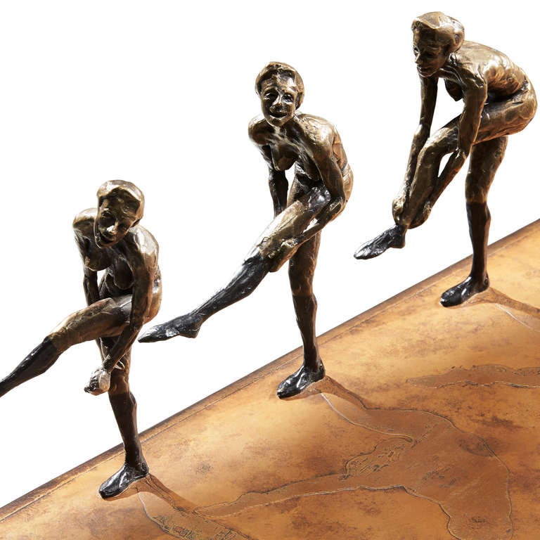 Ltd Edition Cast Bronze Console Table by Nick Davis, England, 2013

This solid bronze console has a very limited edition of only 5 with 3 Artist Proofs. 
The figures on top depict the sequence of a lady putting on her sock and erupting in fits of