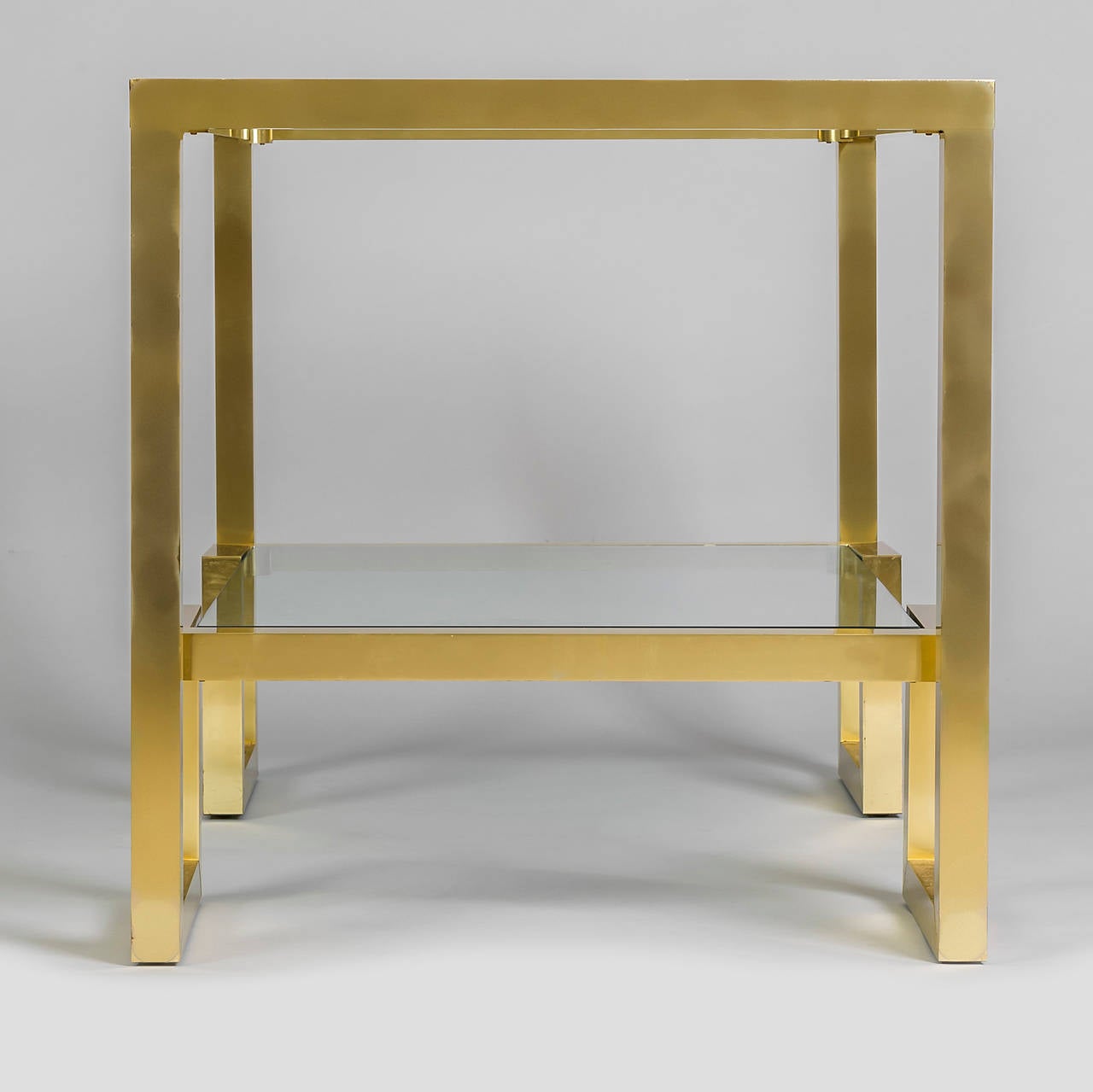 Lacquered Pair of French 1970s Brass Console Tables with Glass Top and Shelf