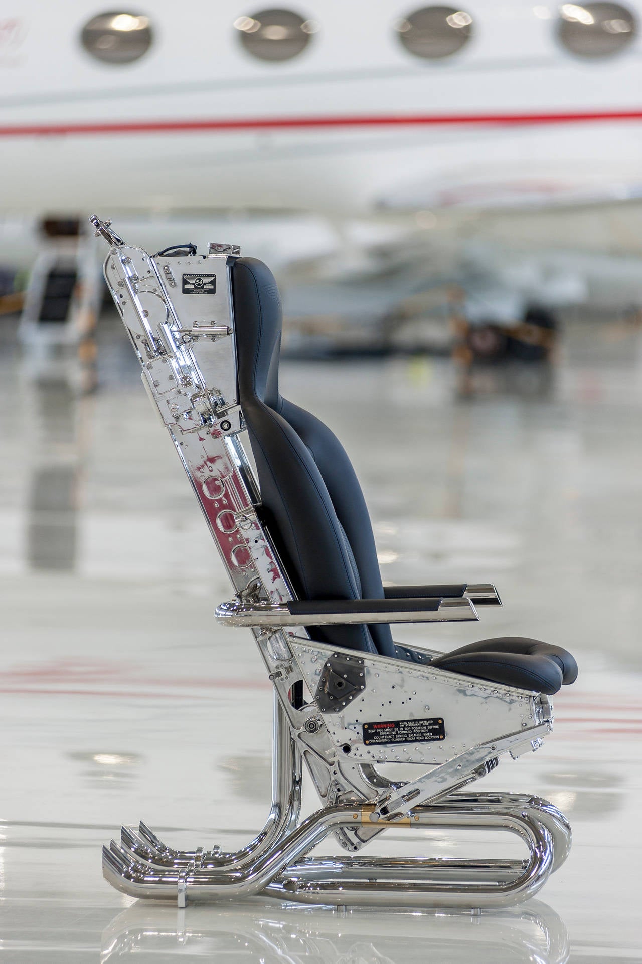 Martin Baker MK3 ejection seat chair, black edition, England, 2014.

This piece was developed using the Martin-Baker MK3 ejector seat. The MB MK3 seat was first introduced on the 1st November 1955 and was used in iconic combat aircraft including