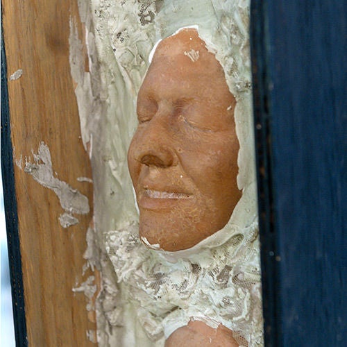 English Wall Sculpture Featuring Four Resin Faces, England, 1940s