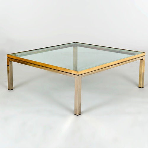 Low centre table with mirrored surround and heavy glass top, Italy, 1970s.
