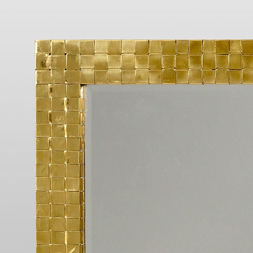 Brass framed mirror, USA, 1978 from the Chapman Studio.

Like many other studios, Chapman would often bring in independent artists and designers to create a product or range for them. 

Please note that we only have one mirror available.