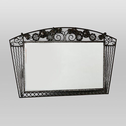 Fine wrought iron mirror with floral motif, France, 1950s.
