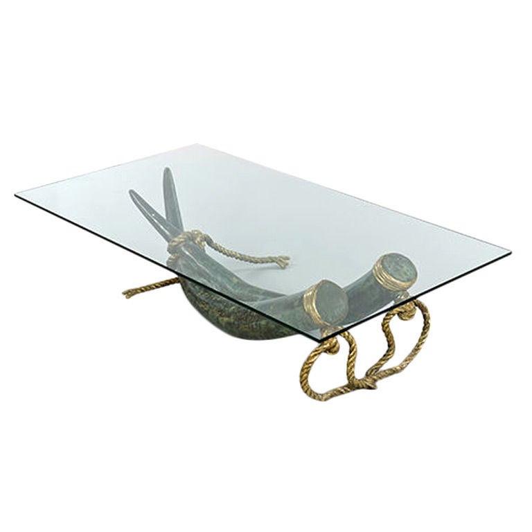 Bronze "Tusk" centre table, France, circa early 1970s with 'solid' rope and heavy glass top.