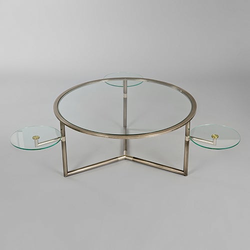 Chrome and glass coffee table with three rotating lower tables
France (prob.) c1965/1970.

Note that the dimensions increase to approximately 143 cm with the lower tables extended.