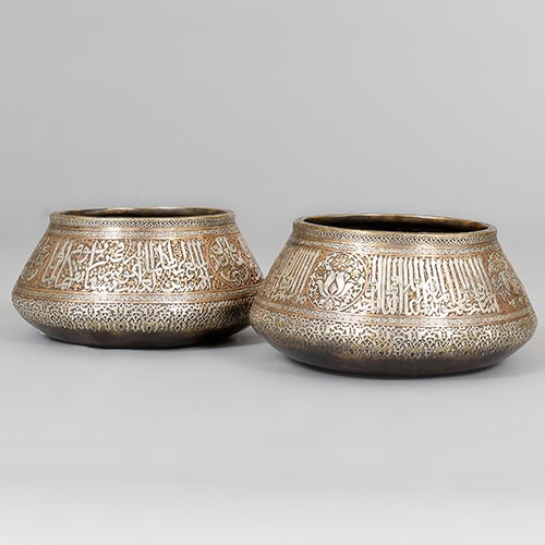 Copper, silver and brass Islamic bowl with calligraphy and fish motif showing signs of typical Damascus-style metalwork. Please note that we have two similar bowls; the price shown is per bowl. Syria, c1920/40.
