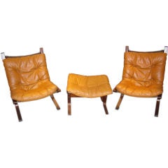 Pair of Leather Club Chairs and Ottoman