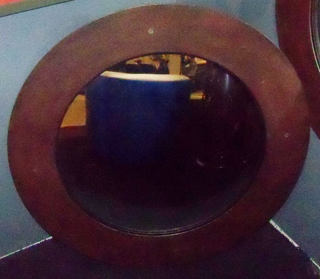 pair of industrial bullseye mirrors