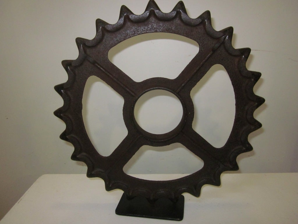 pr of sculptural iron gears