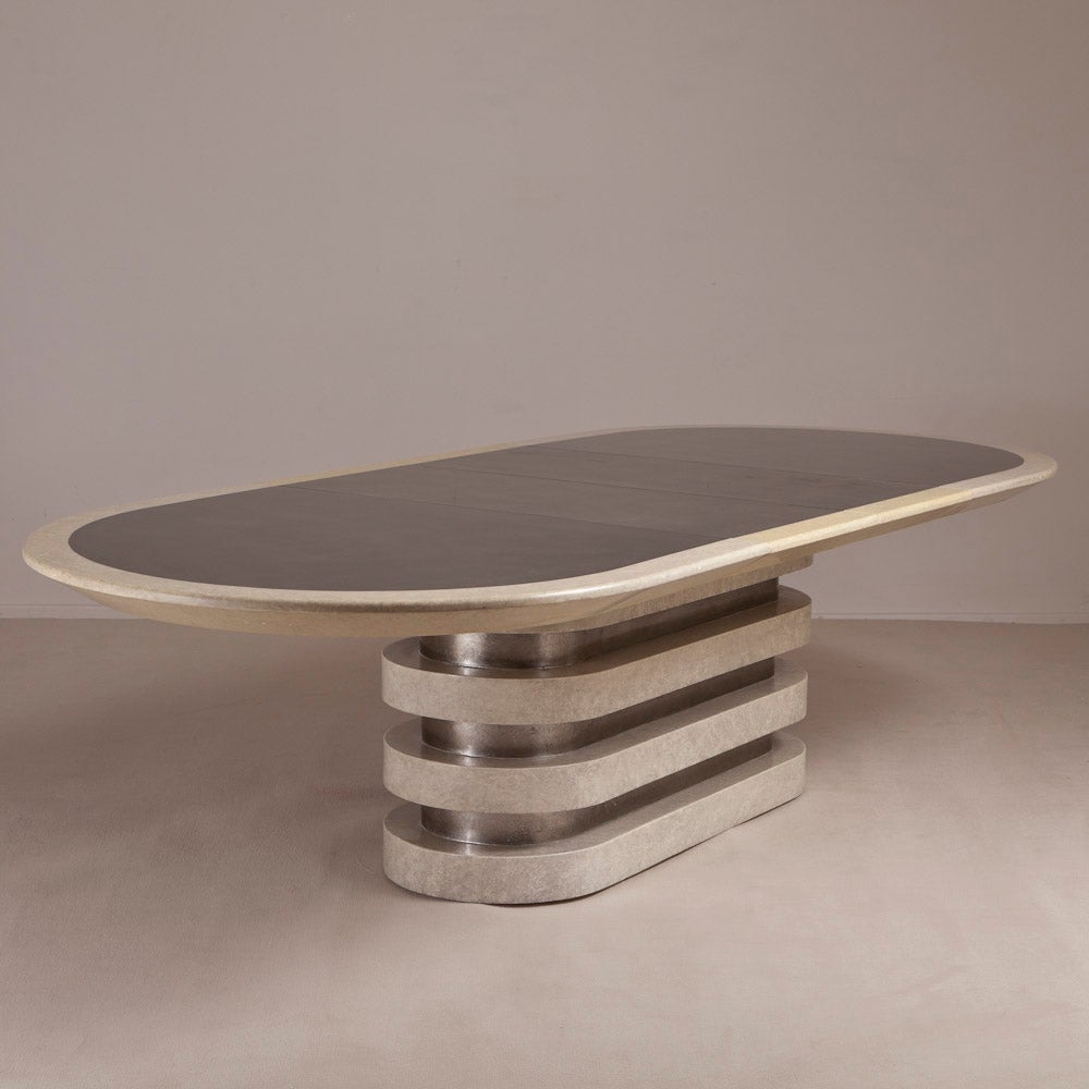 A Simulated Goatskin and Silverleaf Lacquered Dining Table