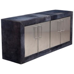 A Paul Evans Suede and Stainless Steel Four Door Cabinet