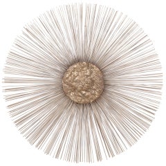 A Metal Sunburst Wall Sculpture 1970s