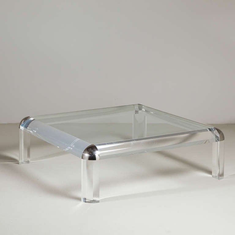 A Karl Springer designed Chunky Lucite and Nickel Framed Coffee Table with Inset Glass 1980s