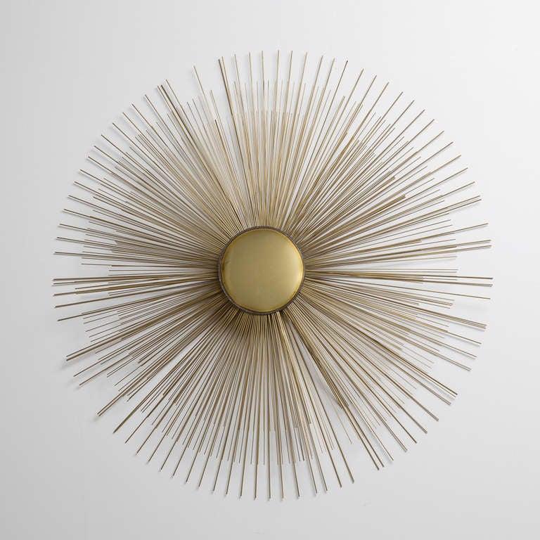 A Large Polished Brass Starburst Wall Sculpture USA 1970s