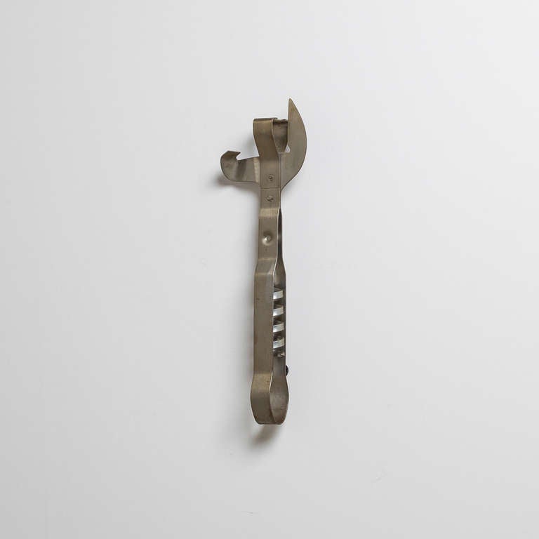 An exceptionally rare small metal can opener wall sculpture by Curtis Jere signed and dated 1979.

Curtis Jeré is the collaboration of two metal sculptors Jerry Fels and Curtis Freiler who founded the company Artisan House in the USA in 1963. These