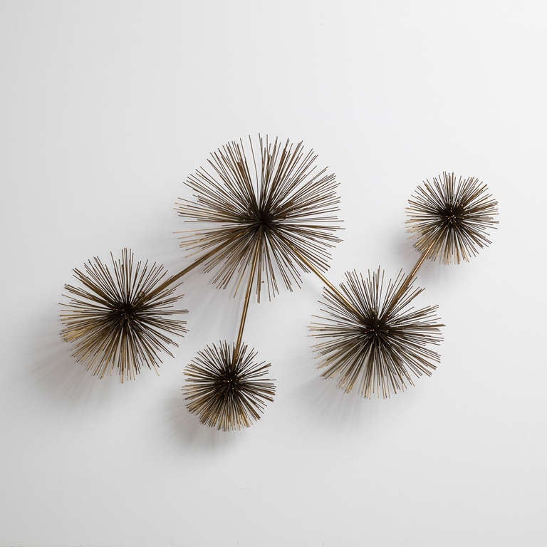 A PomPom Metal Wall Sculpture by Curtis Jere USA signed and dated 1979