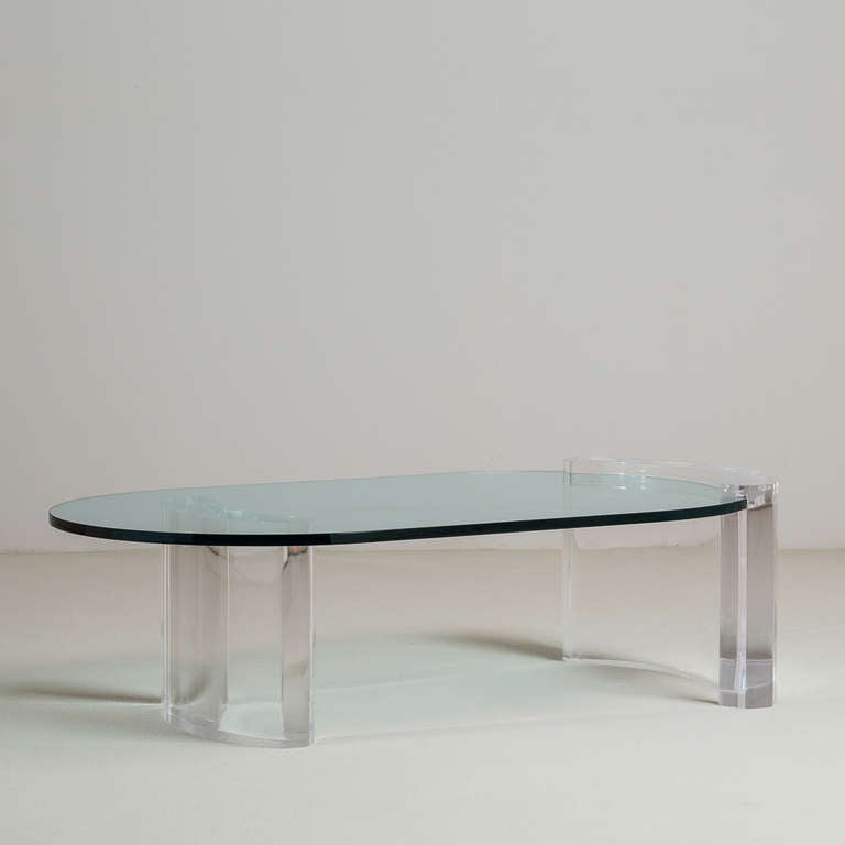 A Superb Lucite Coffee Table with a Curved Base and Inset Oval Glass Top circa 1975