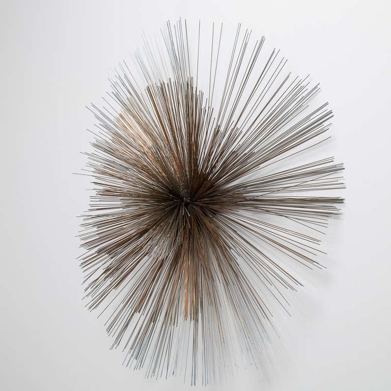 A Large Two Tone Metal Starburst Wall Sculpture by Curtis Jere 1970s