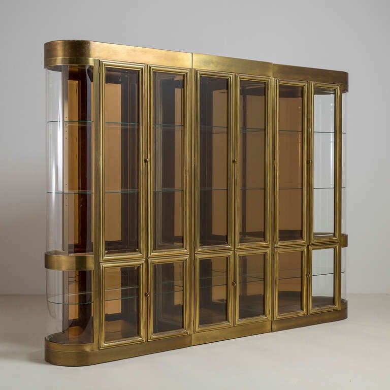 A large three part mastercraft designed brass display cabinet 1980's.