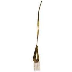 A Polished Brass Table Sculpture attributed to Curtis Jere