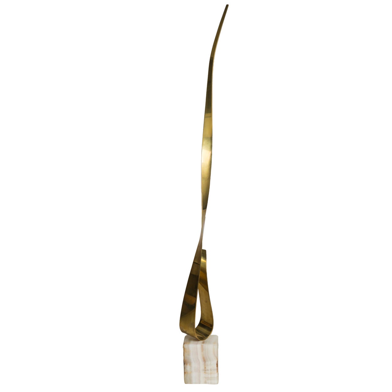 A Polished Brass Table Sculpture attributed to Curtis Jere