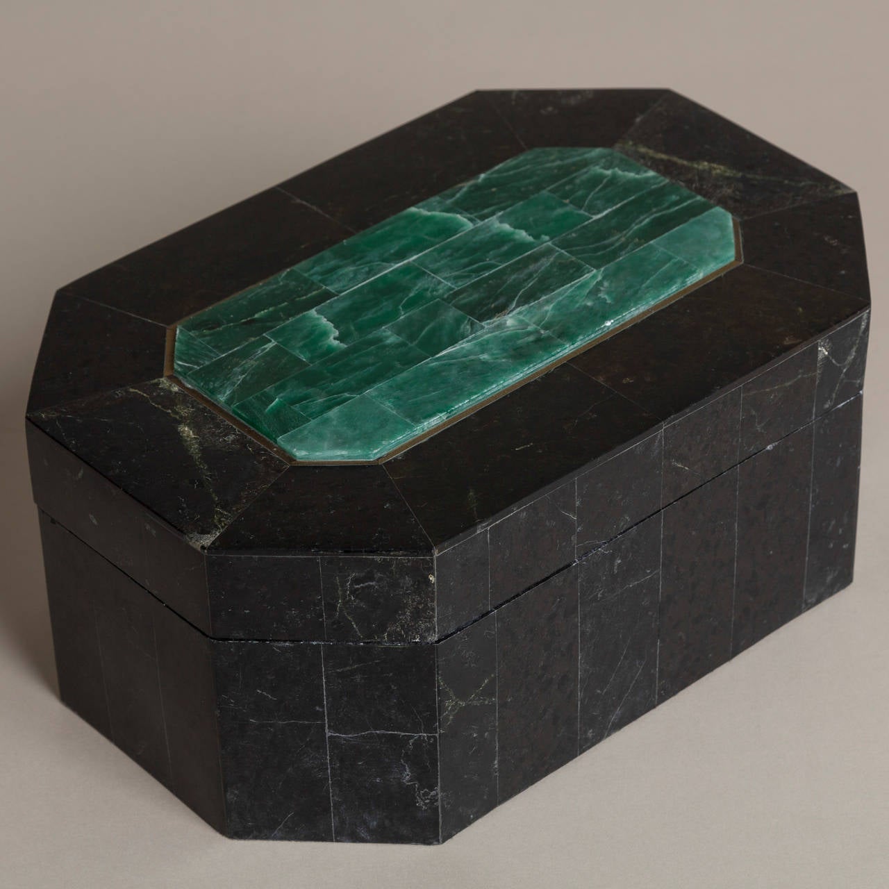A hexagonal Maitland Smith designed stone veneered lidded box with malachite inlay, 1970s.