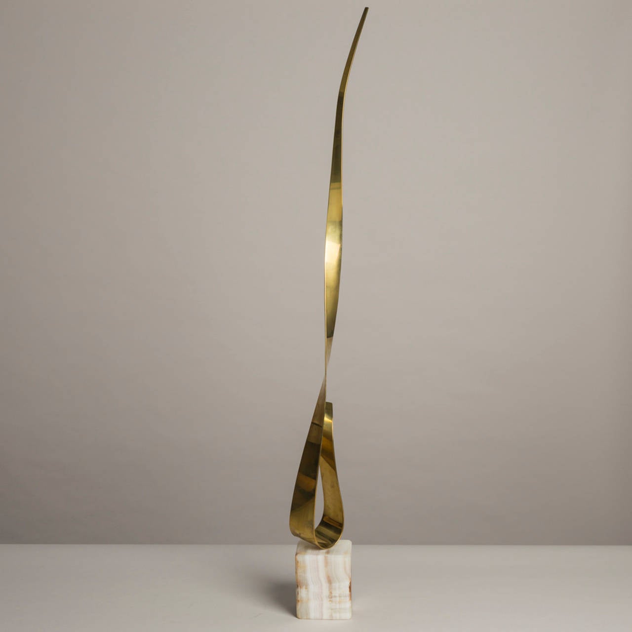 A Polished Brass Table Sculpture attributed to Curtis Jere USA