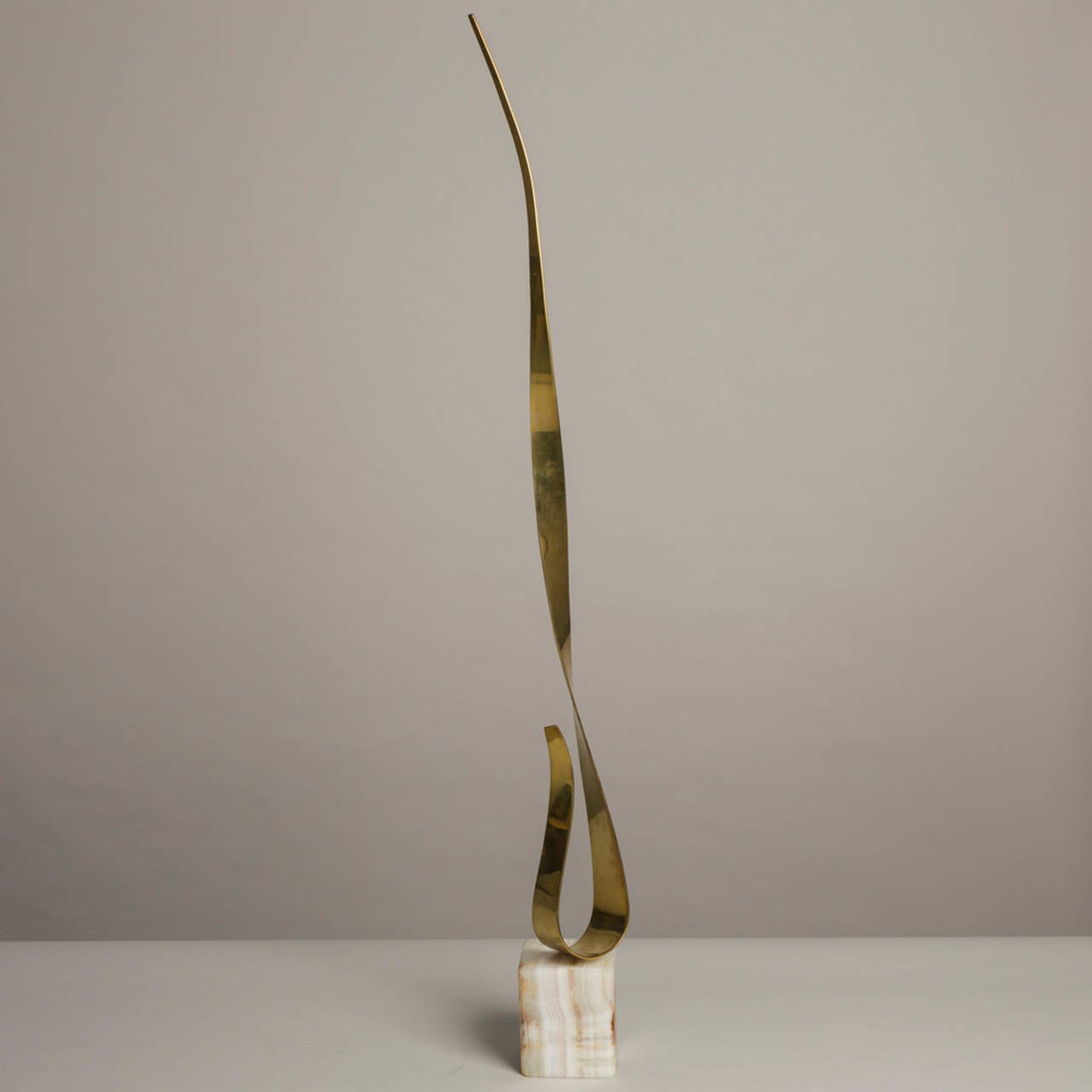 American A Polished Brass Table Sculpture attributed to Curtis Jere