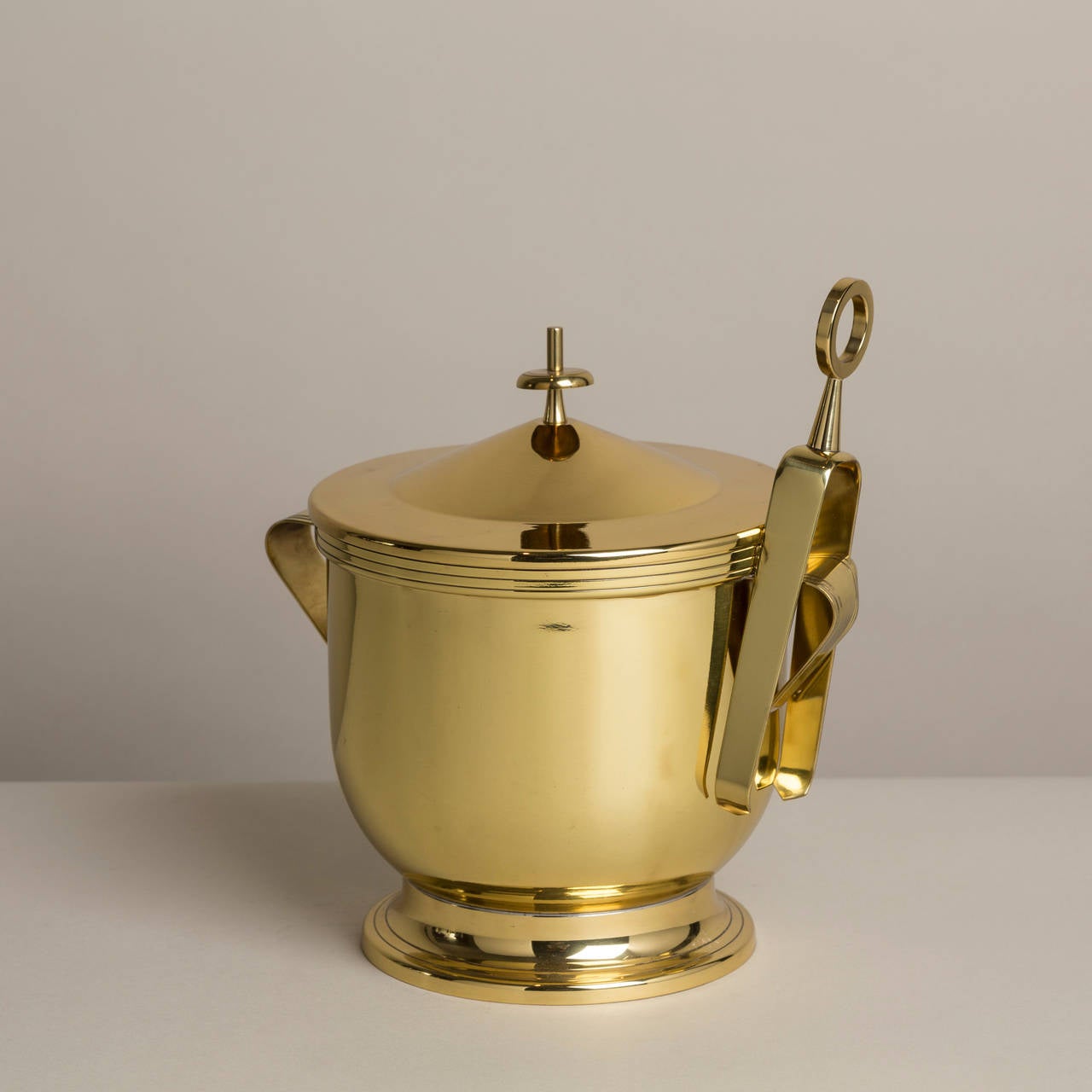 A Brass Ice Bucket and Tongs designed by Parzinger for Dorlyn 1950s stamped