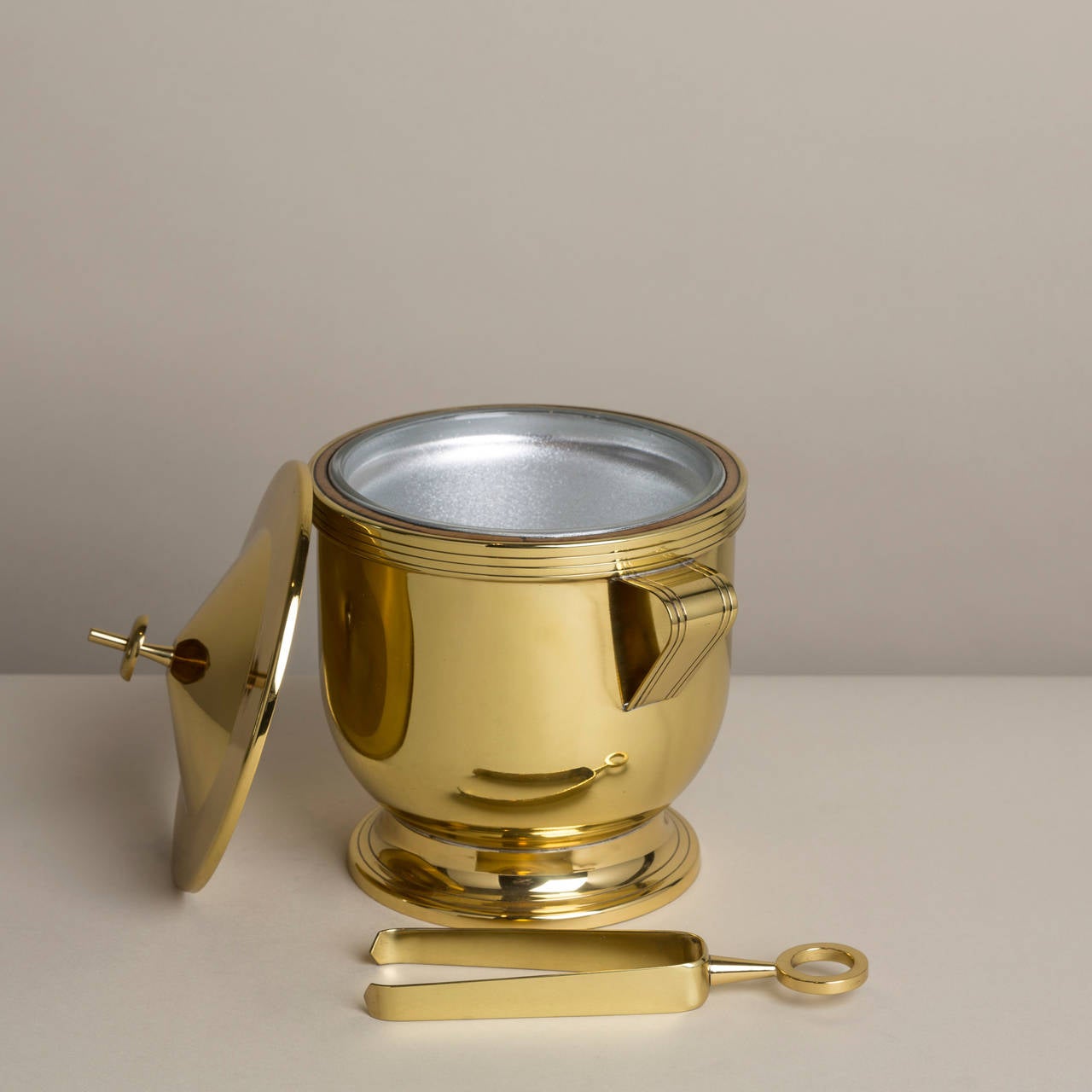 American A Brass Ice Bucket and Tongs designed by Parzinger 1950s stamped
