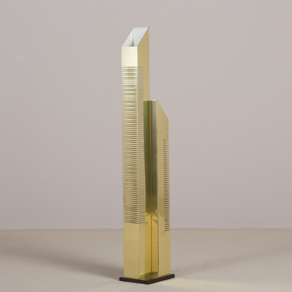 A rare Curtis Jere brass skyscraper floor lamp signed and dated 1979.
