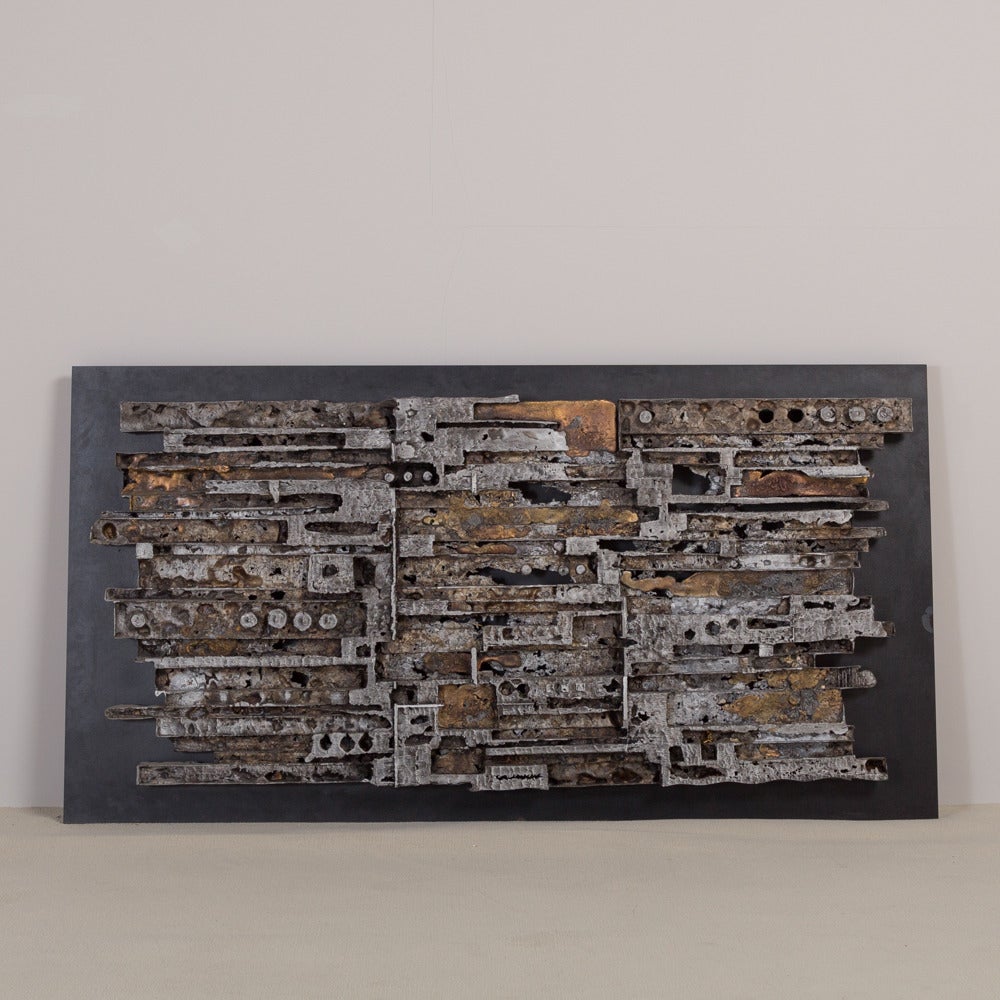 A Substantial Silvered Cast Metal Brutalist Sculptural Wall Panel Mounted on Steel