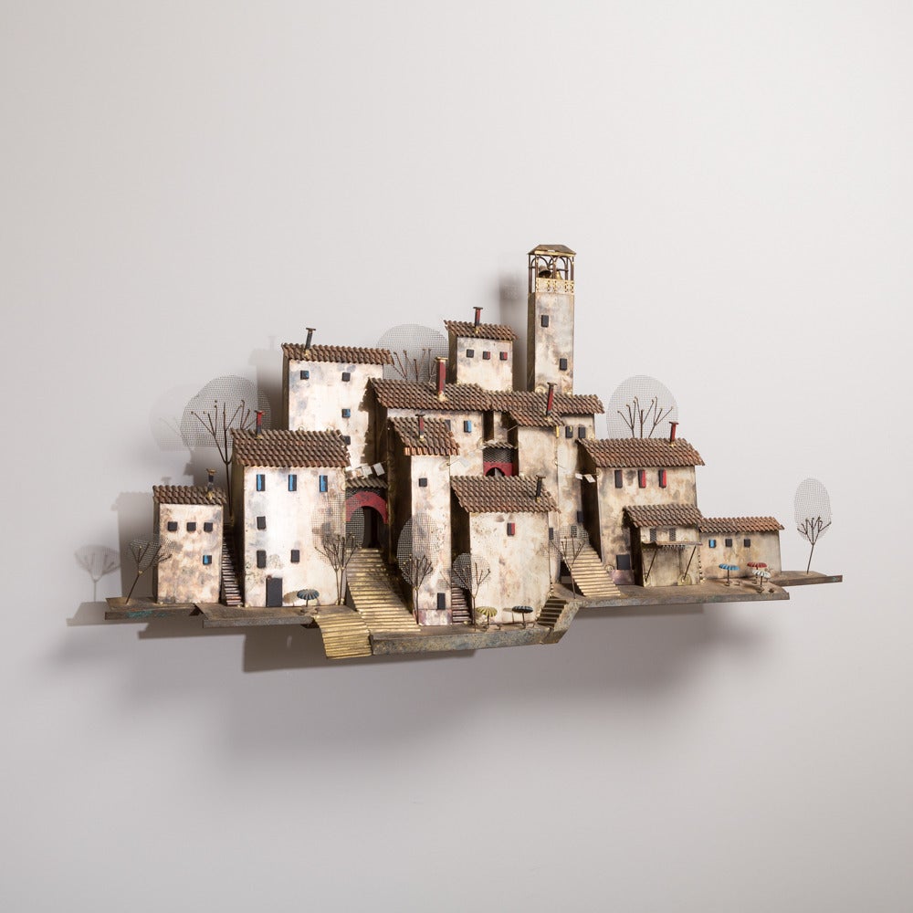 A Village Scene Metal Wall Sculpture by Curtis Jere signed

NB: These items are subject to a further discount over and above the trade when exported outside the EU of 10%