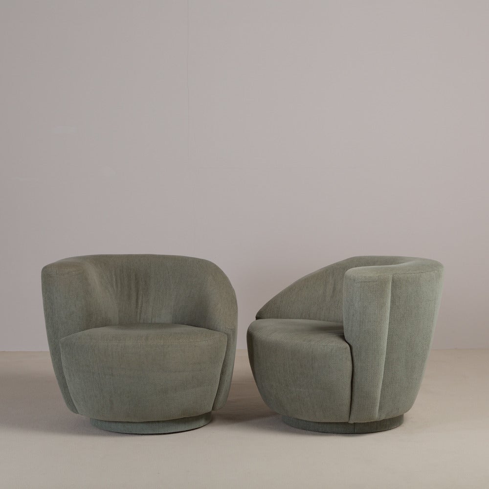 A Pair of Nautilus Swivel Chairs designed by Vladimir Kagan circa 1980s