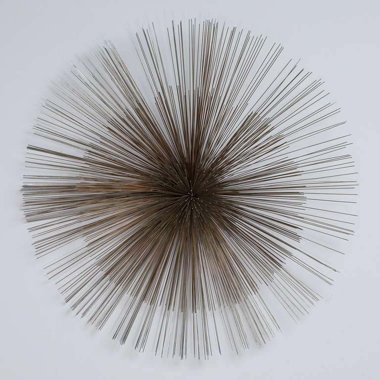 American A Large Three Tone Starburst Wall Sculpture by Curtis Jere