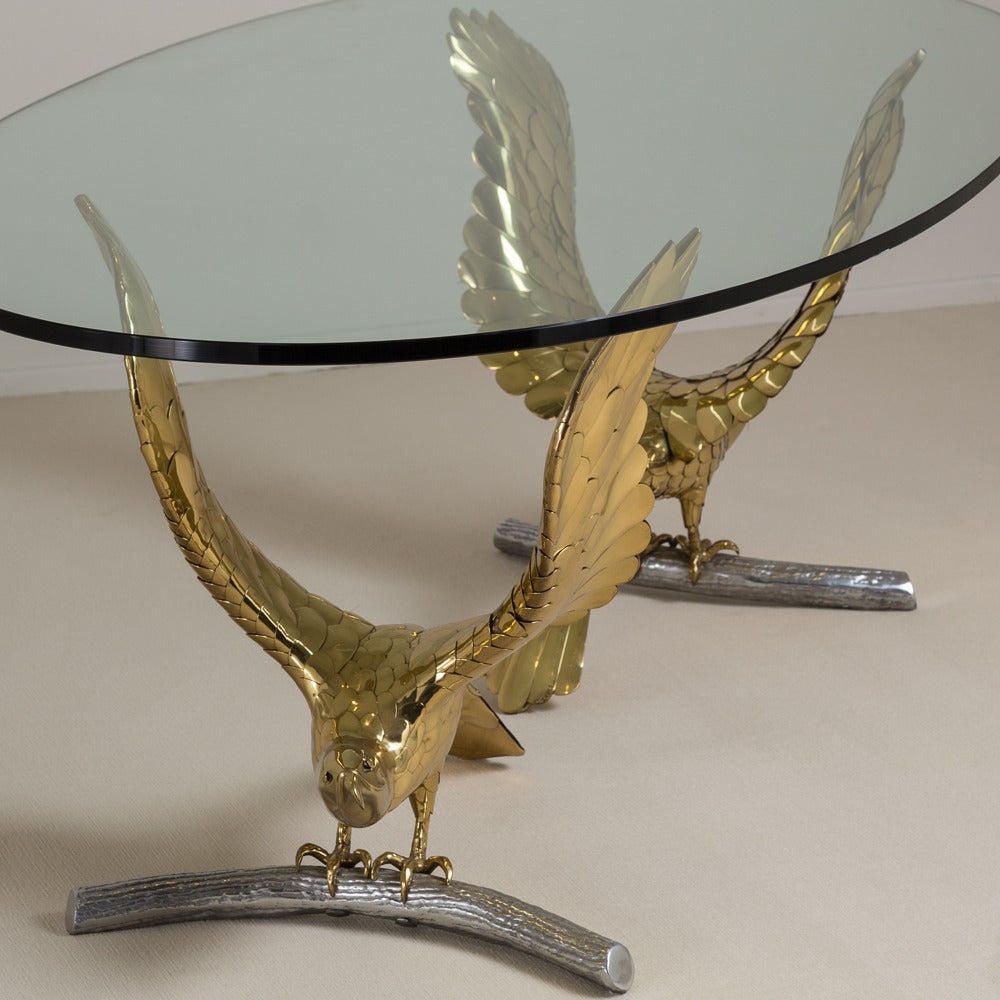 A superb Alain Chervet designed brass and cast bronze eagle based dining table, circa 1980 stamped

Measures: Each base 73cm x 62cm x 72cm high