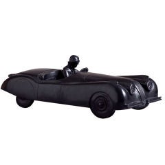 A Black Patinated Bronze Cast of a Jaguar XK120 by Talisman