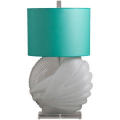 A 1960
s Clear and Opaque Acrylic Lamp on Lucite Base