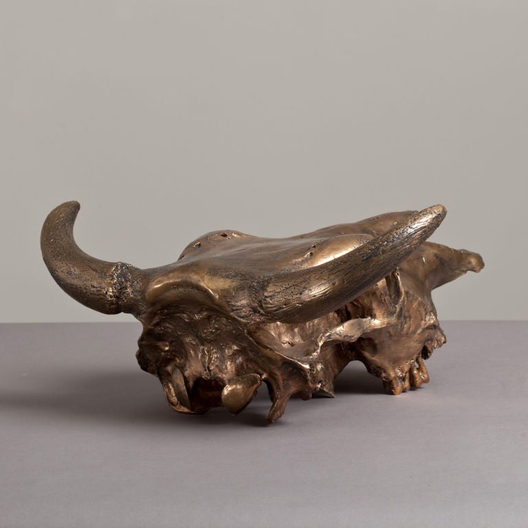 A Gilded Bronze Cast of a Skull by Talisman