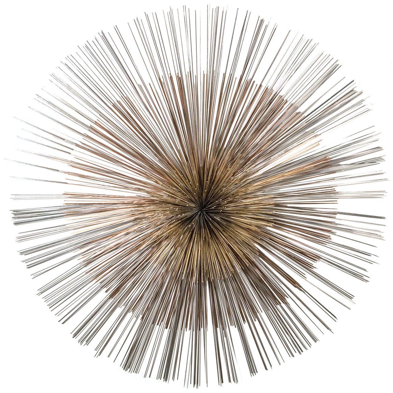 A Large Three Tone Starburst Wall Sculpture by Curtis Jere